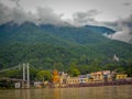 Landscape view of Mountains with dense clouds in the sky. View of Ganga river in Rishikesh india