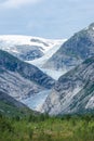 Landscape view of the Nigardsbreen melting glacier and the forest in  Norway Royalty Free Stock Photo