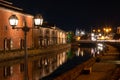 Landscape view of Otaru canals and warehouse at night in Hokkaido Japan Royalty Free Stock Photo