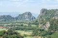 Landscape view over rainforest limestone mountains from Phu Pa Por view point at Loei province ,Thailand .