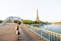 Landscape view on Paris with bridge and Eiffel tower