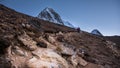 Landscape view of path and two climbers walking to the top of Kala Patthar. Royalty Free Stock Photo