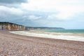 Landscape view of peppel beach and cliffs in background in Dieppe in Seine Maritime department in the Normandy region of northern
