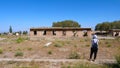 Landscape view of a photographer taking picture in a desert small town, a filming location in Gansu China