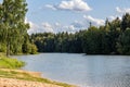 Landscape view with a pond in a forest area