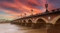 Landscape View of the Pont de pierre with sunset sky scene which The Pont de pierre crossing Garonne river Royalty Free Stock Photo