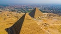 Landscape view of Pyramid of Khafre and Pyramid of Khufu, Giza pyramids landscape. historical egypt pyramids shot by drone. Royalty Free Stock Photo