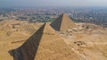 Landscape view of Pyramid of Khafre and Pyramid of Khufu, Giza pyramids landscape. historical egypt pyramids shot by drone. Royalty Free Stock Photo