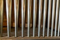 Landscape view of a rank of shiny steel pipes of a refurbished church organ Royalty Free Stock Photo