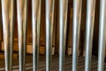 Landscape view of a rank of shiny steel pipes of a refurbished church organ Royalty Free Stock Photo