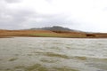 Andscape view of river bank with dry land Royalty Free Stock Photo