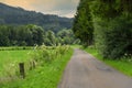 Road across the countryside in Austria on a cloudy day