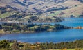 Landscape view of the rolling hills and harbour of Akaroa Royalty Free Stock Photo
