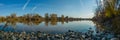 Panorama from Sacramento river levee on a clear fall day with reflections Royalty Free Stock Photo