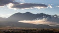 Landscape view of smoke drifting at sunset from control burn in Salida Colorado USA