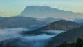 landscape view of Sunrise ray nature foggy and Mount Kinabalu, Sabah, Borneo Royalty Free Stock Photo