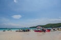 Landscape view of tawean beach with crowded of tourist on the beach in cloudy day