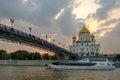 Landscape with view on temple of Christ the Savior on sunset and cruise ship on the river Royalty Free Stock Photo