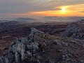 Landscape view from top of mountain on misty morning across countryside