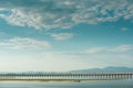 Landscape View of Train crossing Pasak Chonlasit Dam. Reservoir for agriculture at Lopburi,Thailand