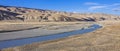 Landscape with view of wide floodplain of mountain river