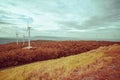 Landscape View of Windmill Farm in the Mountains. Power electrical plant supply from natural energy infinity source Royalty Free Stock Photo