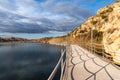 Landscape view of the wooden boardwalk and lake of the Elche reservoir in southern Spain Royalty Free Stock Photo