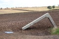 Landscape views overa field of harvested crops,blocked gate way