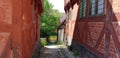 A landscape with a vintage buildings and a stone street.