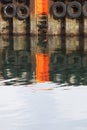 Orange reflection in an icelandic port. Royalty Free Stock Photo