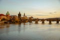 landscape with Vltava river and Karlov most at sundown in autumn in Prague