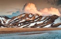 Landscape of volcanic mountain with snow covered and sunset sky among Icelandic Highlands on summer in Landmannalaugar at Iceland Royalty Free Stock Photo
