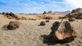 Landscape of volcanic rocks and in desert at bright sunny day. Martian terrain landscape