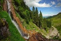 Summer landscape with Cascada Cailor (Horses Waterfall) in Rodnei Mountains, landmark attraction in Romania