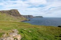 Landscape of Waterstein Head mountain and water bay near Neist Point Lighthouse at Isle of Skye, Scotland Royalty Free Stock Photo