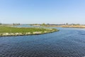 Landscape with waterways and canals of North Holland with boats, canal-side lifestyle in the Netherlands Royalty Free Stock Photo