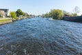 Landscape with waterways and canals of North Holland with boats, canal-side lifestyle in the Netherlands Royalty Free Stock Photo