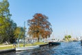 Landscape with waterways and canals of North Holland with boats, canal-side lifestyle in the Netherlands Royalty Free Stock Photo