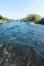 Landscape with waterways and canals of North Holland with boats, canal-side lifestyle in the Netherlands Royalty Free Stock Photo