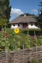 Landscape with wattle, and old house