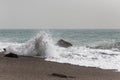 Waves crushing at the shore at sandy beach. Royalty Free Stock Photo
