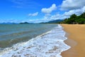 Landscape of waves rolling onto the shore of Palm Queensland Australia