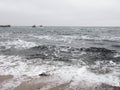 The city of Odessa. Ukraine. Coast near Fontana Street. Panorama of the stormy Black Sea in the feast of Epiphany.