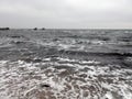 The city of Odessa. Ukraine. Coast near Fontana Street. Panorama of the stormy Black Sea in the feast of Epiphany.