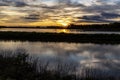 Landscape of a wetland conservation area near St. Charles, MO at sunset