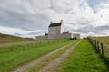 Landscape with white Corgarff Castle in Socttish landscape at sunny afternoon