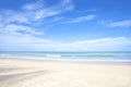 Landscape of white sand beach with  blue sea and cloudy blue sky background for summer travel concept. Royalty Free Stock Photo