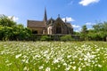 Landscape Wild flower meadow with old Church in england Royalty Free Stock Photo