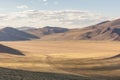 Landscape with wild horses near the mountain. Altai, Siberia Royalty Free Stock Photo