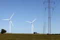 Landscape with wind turbines and high voltage power line Royalty Free Stock Photo